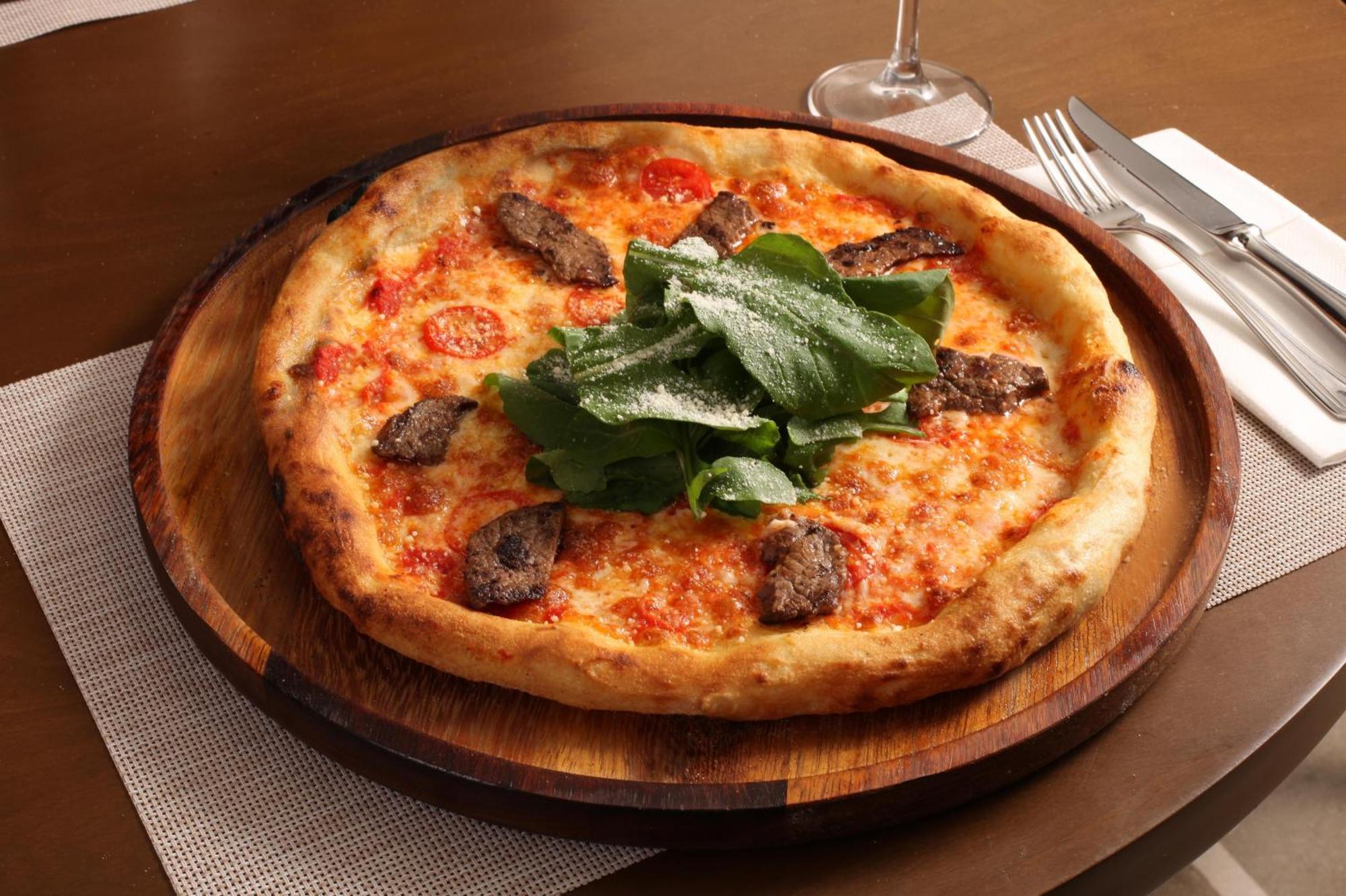 Bentley Hotel Bosphorus - Special Class Истанбул Екстериор снимка A pizza with sausage and arugula
